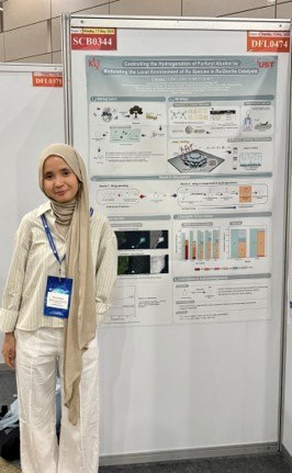 Vanny presenting her poster at ISCRE29