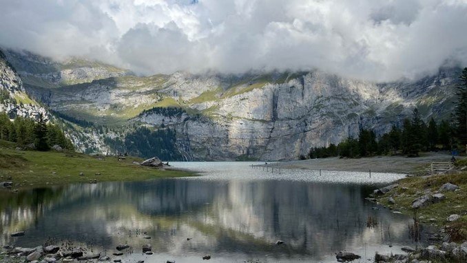An alpine lake surrounded by limestone cliffs